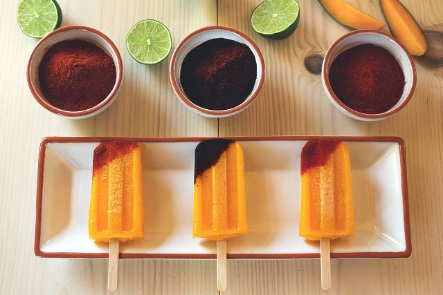Tequila-Spiked Mango Popsicles with Chile // HonestlyYUM