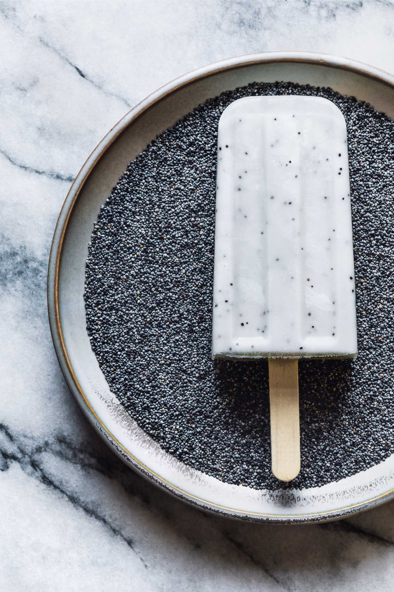 Lemon Poppy Seed Popsicles | HonestlyYUM (honestlyyum.com) #popsicleweek #summer #recipes #popsicles