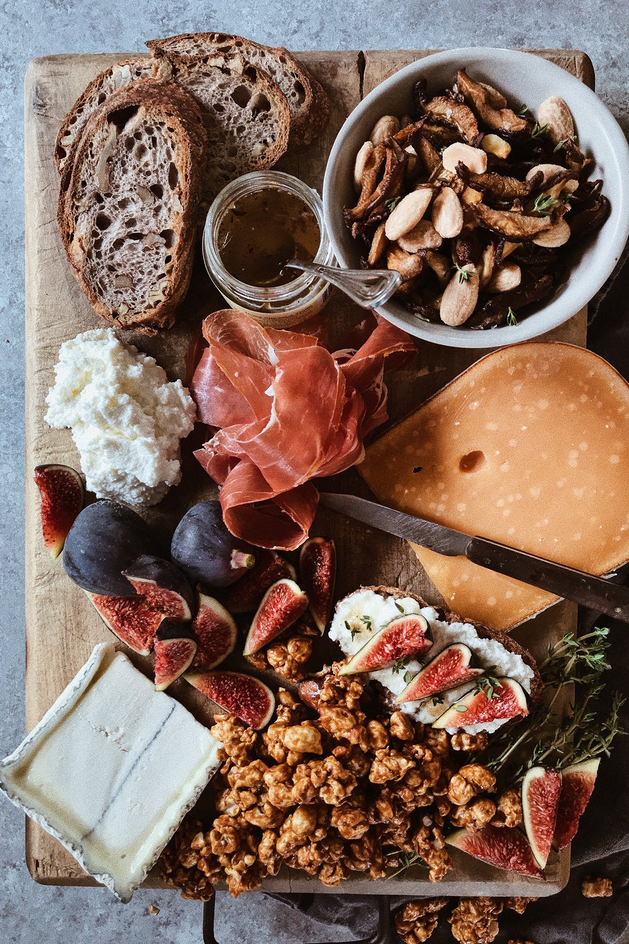 Cheese platter with black truffle almonds + roasted shiitake mushroom mix